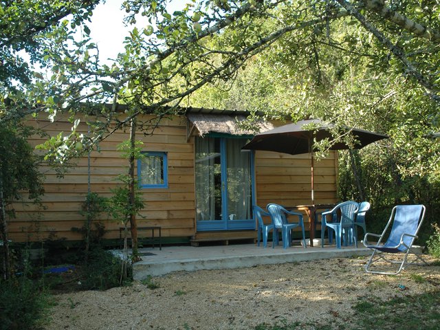 Mobile home near the apple tree